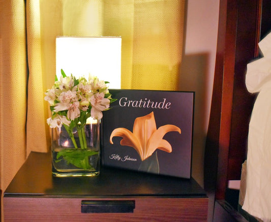 Kelly Johnson's book Gratitude on a nightstand